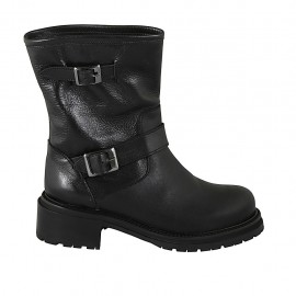Woman's ankle boot with buckles in black leather heel 4