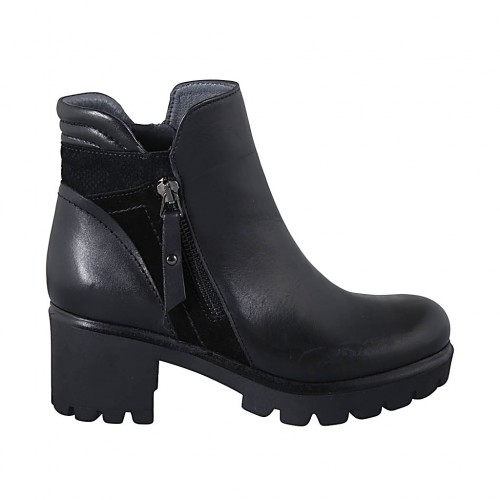 Woman's ankle boot with zippers in black leather and suede heel 5