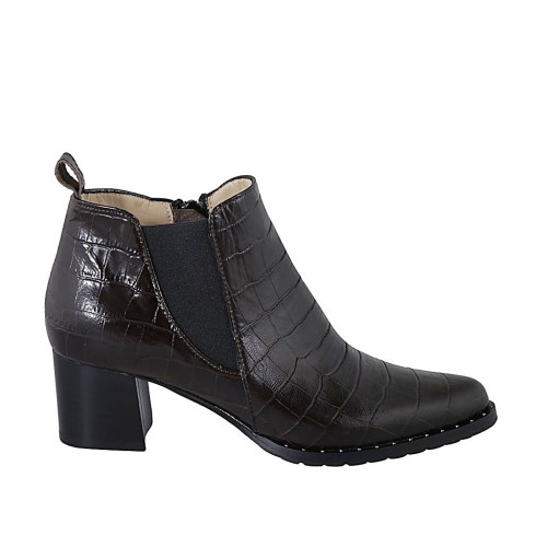 Woman's pointy ankle boot with zipper, studs and elastic band in brown printed leather heel 5