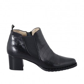 Woman's pointy ankle boot with zipper, studs and elastic band in black printed leather heel 5