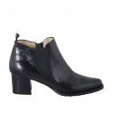 Bottines à bout pointu pour femmes avec fermeture éclair, goujons et elastique en cuir imprimé noir talon 5