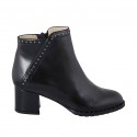 Woman's ankle boot with zipper and studs in black leather heel 5