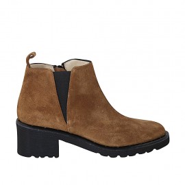 Woman's ankle boot with zipper, studs and elastic band in tan brown suede heel 5