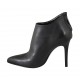 Woman's pointy ankle boot with posterior zipper in black leather heel 10