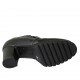 Woman's highfronted shoe with elastics and removable insole in black leather heel 7