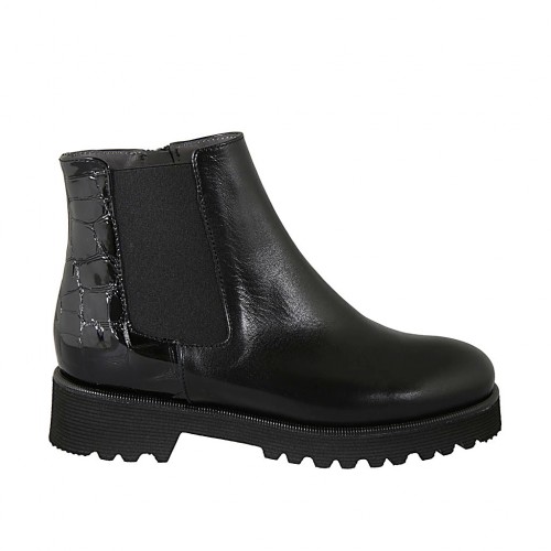 Woman's padded ankle boot in black printed patent leather and leather with zippers, elastic band  and removable insole heel 4