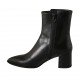 Woman's pointy ankle boot with zipper and buttons in black leather and printed leather heel 6