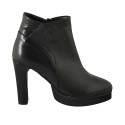 Woman's ankle boot with zipper and platform in black leather with heel 10