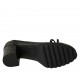 Woman's pump with bow in black leathera and printed leather heel 6