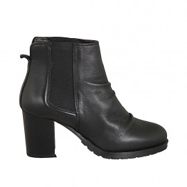 Woman's ankle boot in black leather with elastic bands heel 7 - Available sizes:  42, 43, 44