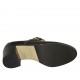 Woman's highfronted shoe with buckle and studs in black leather heel 6