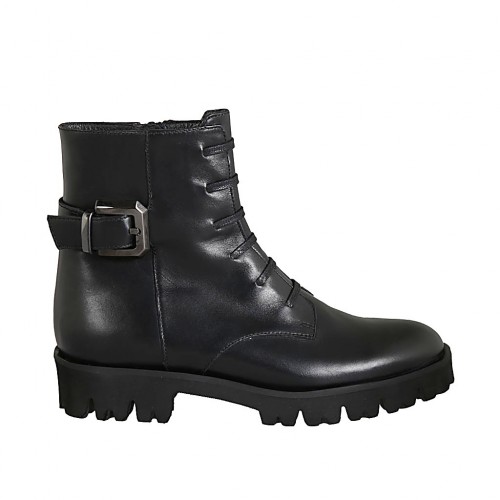 Woman's ankle boot with buckle, zipper and sewn laces in black leather heel 3